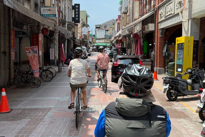 4 Hour Afternoon Cycling City Tour North with Snack - Open river views at Dadaocheng Pier Plaza