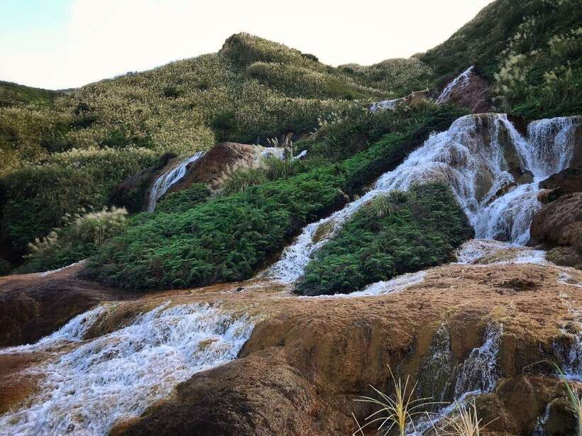 From Taipei: Old Gold Rush Town Jiufen Guided Night Tour - The Golden Waterfall’s unusual color