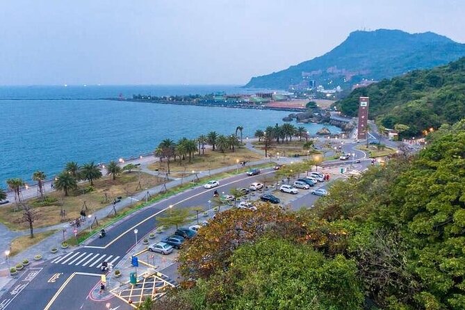 Full-Day Private Guided Tour in Kaohsiung Port Shore - Sizihwan offers harbor views and a mountain setting