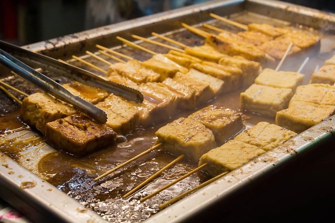 Sip & Savor: Maokong Tea & Shenkeng Stinky Tofu Private Day Tour - Zhinan Temple adds a spiritual pause