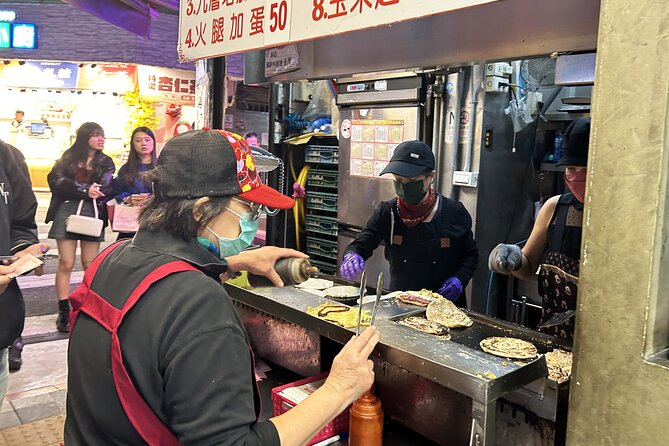 Taipei Hidden Eats, Market & Street Food Tour with 8+ Tastings - Walking through the university district