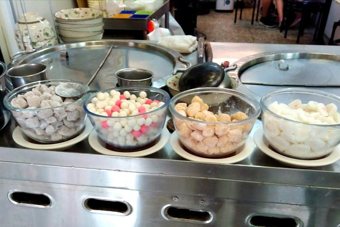 WoknRoll Taipei Walking and Historical Food Tour - Walking through Dihua Street and old Dadaocheng